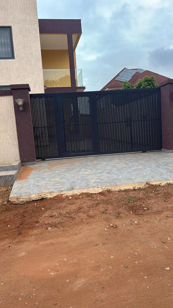 The gated entrance to the firm’s offices.
