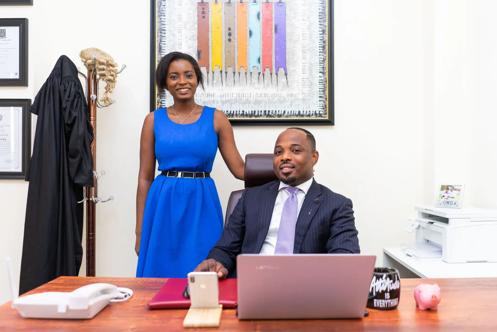 Two colleagues reviewing a matter together at a desk.
