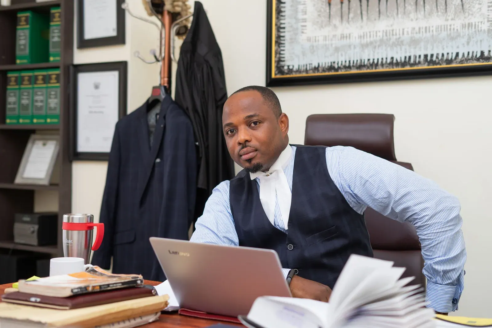 A lawyer of the firm preparing submissions at his desk.