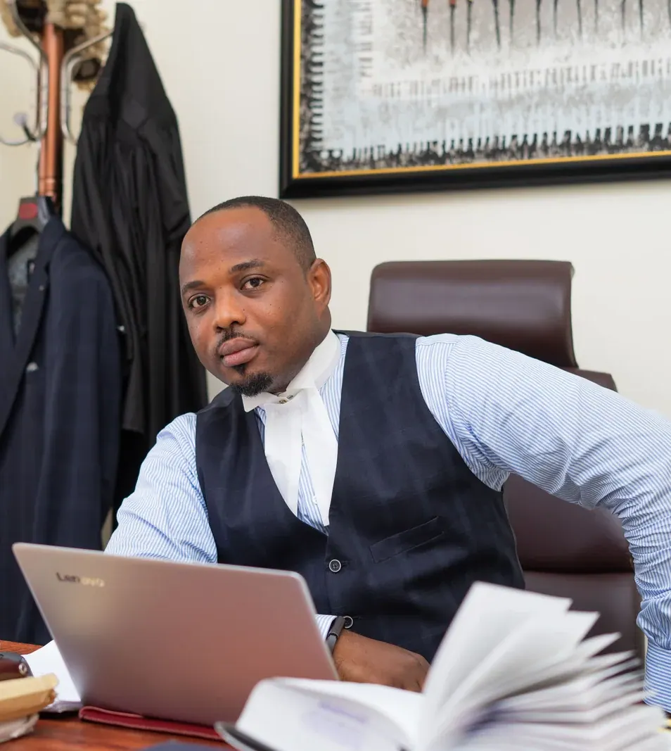 Eddie MacCarthy, Founder and Senior Partner, at his desk in the firm's Accra chambers.
